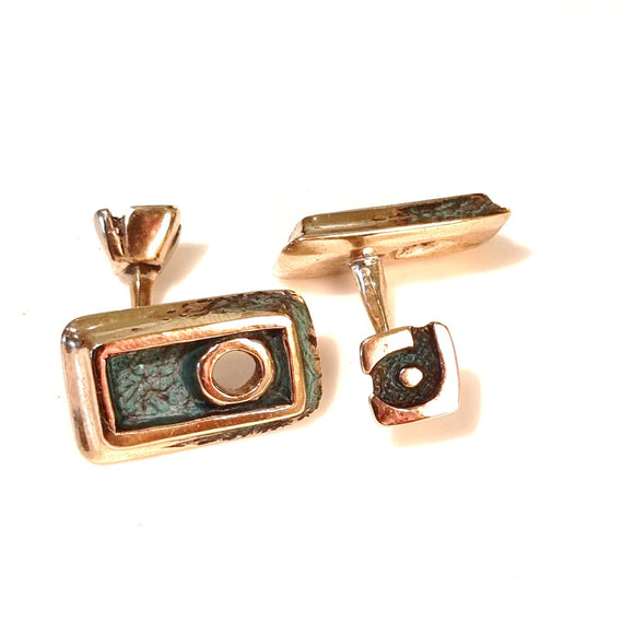 Bronze rectangular cufflinks inspired by brutalist jewellery from the 1970’s.  From the 50’s jewellery design, as with other arts, became much more free and experimental. By the 70’s designers like Québec’s Walter Schluep and Israel’s Rachel Gera were playing with shapes, rough textures and oxidation, working with the jewellery making process rather than hiding it. I love the honesty of the approach and the more natural forms that result.