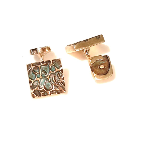 Pair of square bronze cufflinks with a ripple pattern